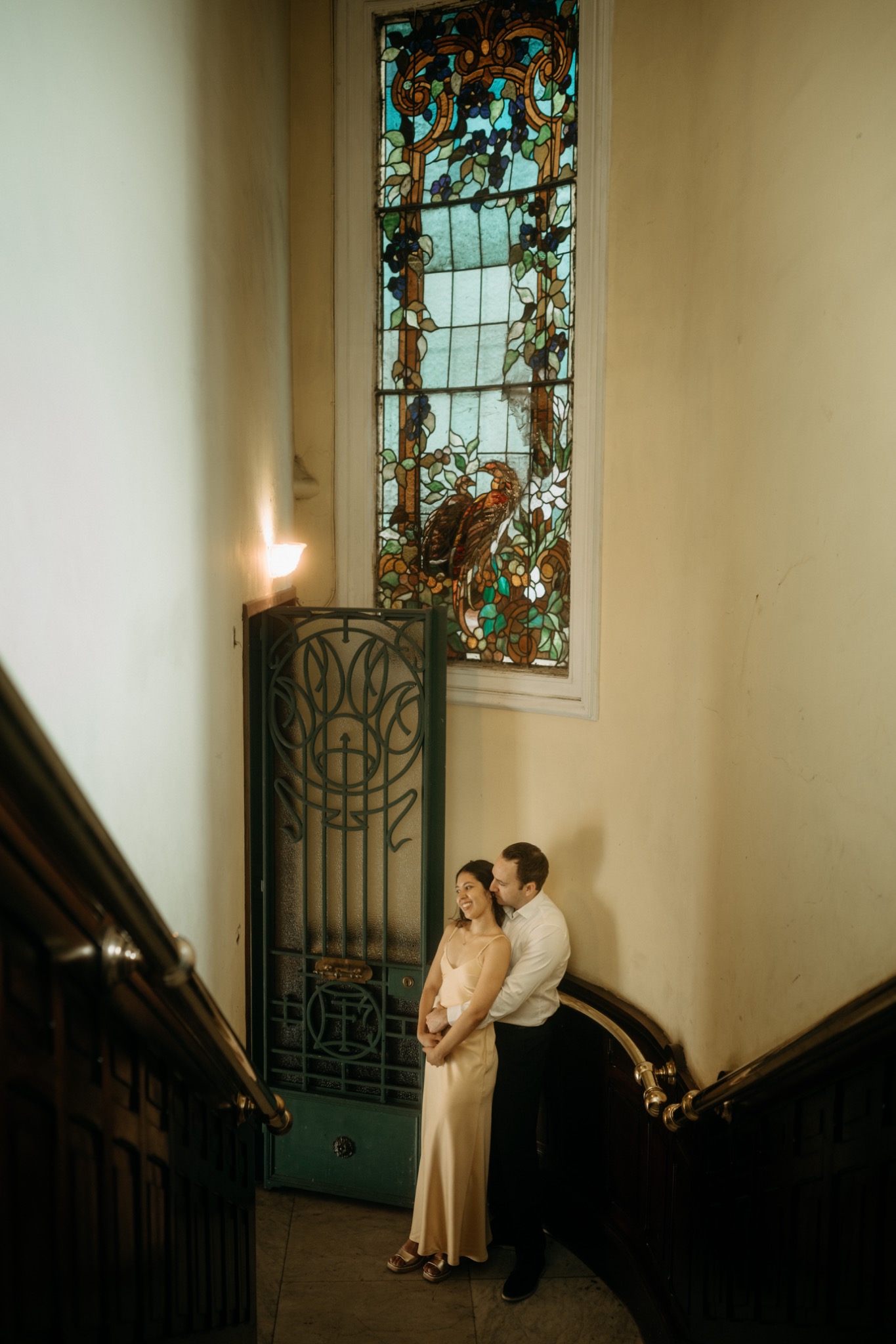Marcia and Alex together on a historic staircase